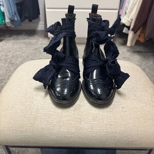 AGL Brogue’s Midnight-Blue Patent Leather Ankle Boots with Bow Detail